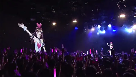 A.I.Channel Kizuna Ai performs for fans at her birthday party in Tokyo in June (Credit: A.I.Channel)