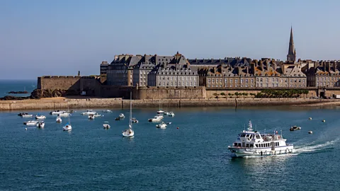 SteveAllenPhoto/Getty Images St-Malo’s community has always been tied to the ebb and flow of the sea, where the rising tides are legendary (Credit: SteveAllenPhoto/Getty Images)