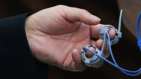 Getty Images A man in China attached to a polygraph machine in 2013. (Credit: Getty Images)