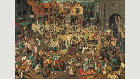 KHM-Museumsverband Drinkers at an inn are at one side of The Battle Between Carnival and Lent, 1559, while the other half is dominated by scenes of piety (Credit: KHM-Museumsverband)