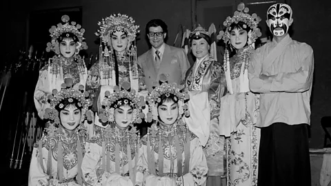 Getty Images Yves Saint Laurent in China, 1985, presenting his latest collections at the Fine Arts Palace of Beijing (Credit: Getty Images)