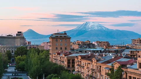 Michel & Gabrielle Therin-Weise/Alamy Most of Yerevan’s buildings were designed with a pink volcanic stone known as tuff, which gives the city a pink glow (Credit: Michel & Gabrielle Therin-Weise/Alamy)