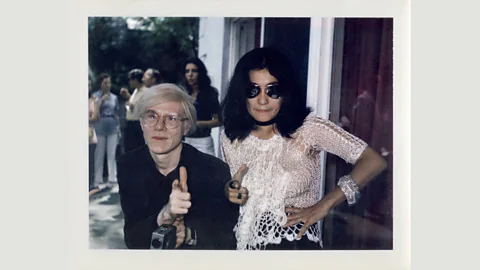 Photo by John Lennon/Copyright Yoko Ono Lennon Polaroid of Yoko with Andy Warhol, signed by John, Yoko and Andy (Credit: Photo by John Lennon/Copyright Yoko Ono Lennon)