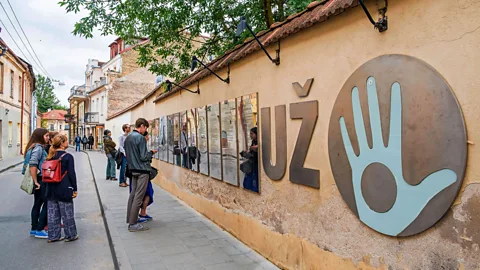 Hemis/Alamy The symbol of Užupis is the Holy Hand, a blue hand with a hole in the middle, making it unable to accept bribes (Credit: Hemis/Alamy)