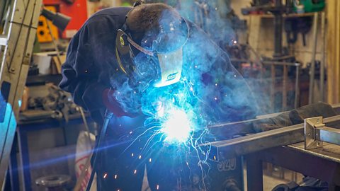 A young man, Billy, welding