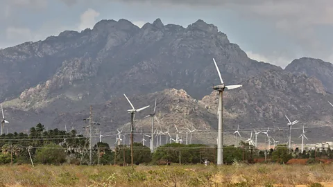 Getty Images Besides its nuclear power schemes, India is also investing heavily in renewable power sources, such as these wind turbines in Punniyavalanpuram, Tamil Nadu (Credit: Getty Images)