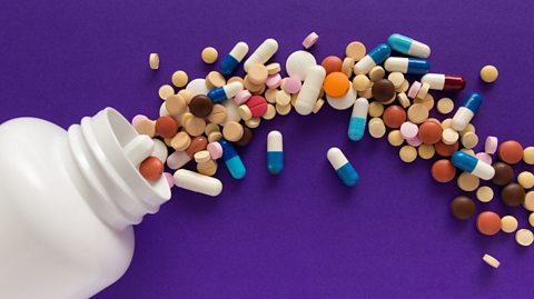 pills spilling out of a bottle