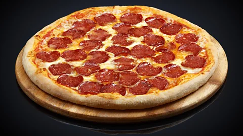 Getty A single 100g slice of frozen pepperoni pizza can have 1.9g of salt (Credit: Getty)