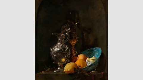 Alamy In Still Life with a Silver Jug (1655-60), Willem Kalf does not portray the objects in much detail, instead using them to reveal reflected light. (Credit: Alamy)
