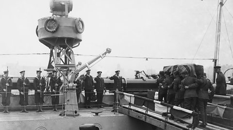 The Unknown Warrior's coffin being taken onto the HMS Verdun