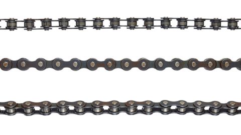 A close-up of three bicycle chains in a line, on a white background.