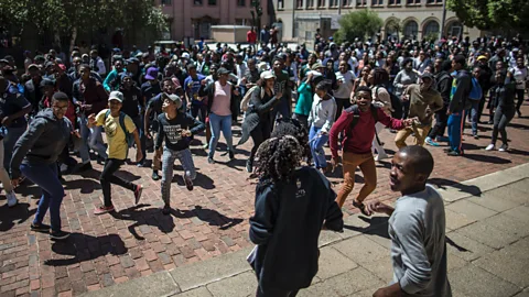 MARCO LONGARI/Getty Images Today, the toyi-toyi is still performed at marches, protests and celebrations (Credit: MARCO LONGARI/Getty Images)