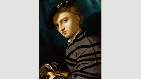 Pinacoteca del Castello Sforzesco, Milano In Portrait of a Young Man with a Book (c 1524–6), Lotto seemed to be showing someone seeking consolation for heartache (Credit: Pinacoteca del Castello Sforzesco, Milano)