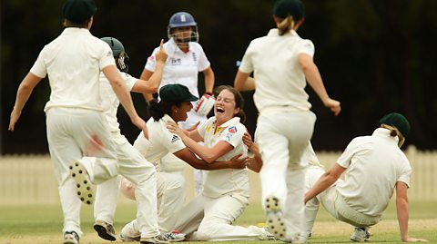 Australia's Rene Farrell celebrating a hat-trick in cricket