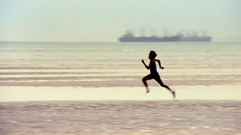 Alamy Amir Naderi’s 1984 film The Runner gave allegorical significance to a boy’s fascination with running (Credit: Alamy)