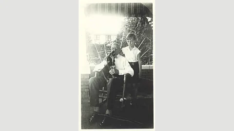 Elizabeth Morton, private collection Gorey, aged seven, in Bradenton, Florida, with his maternal grandfather, Benjamin S Garvey, December 1932 (Credit: Elizabeth Morton, private collection)