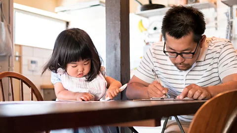 Getty Images The uptake of paternity leave in Japan has risen from 2 to 7 percent - a sign that opinions are changing (Credit: Getty Images)