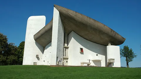 Alamy AI-aided design could lead to exciting new buildings that rival those created by architect Le Corbusier like the Notre-Dame-du-Haut chapel in Ronchamp, (Credit: Alamy)