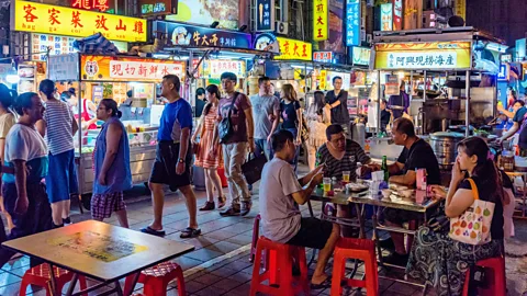 Stockinasia/Alamy Nightlife in Taiwan centres around night markets, where locals gather until the early morning hours to eat (Credit: Stockinasia/Alamy)
