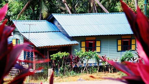 Alamy Today, kampongs have almost entirely disappeared in Singapore (Credit: Alamy)