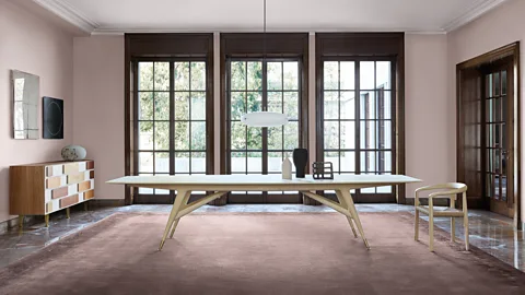 Gio Ponti x Molteni&C Ponti’s D.8591 table, originally designed for the auditorium of the 1958 Time & Life building in New York, has been recreated by Molteni&C (Credit Gio Ponti x Molteni&C)