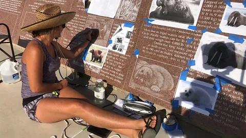 Anne Burke Etched by hand, the panels at the Museum of History in Granite portray everything from the Big Bang to the Moon landing (Credit: Anne Burke)