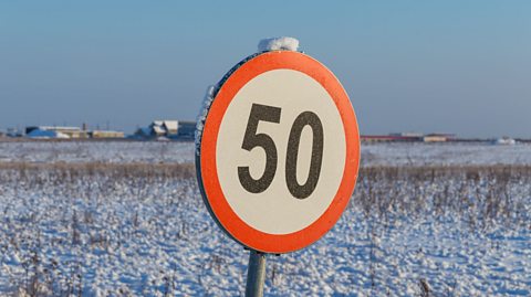 50mph speed limit sign in snow