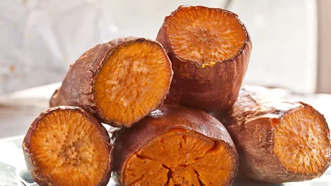 Alamy Sweet potatoes are one of the principle ingredients in traditional Okinawan cuisine (Credit: Alamy)