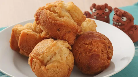 Alamy Okinawan donots are one element of islanders' high carb, low-protein diet (Credit: Alamy)