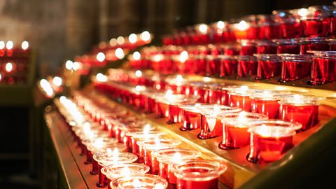 Red candles on a stepped stand