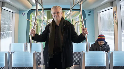 Eric Devillet Fred Tiné drives from France to his office in Luxembourg, a trip which takes 26 minutes by car – but up to two hours by train (Credit: Eric Devillet)