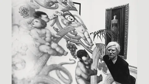 Victoria and Albert Museum Andy Warhol with the Graham Piano at the Burne-Jones exhibition at the Hayward Gallery in London, 1975-1976 (Credit: Victoria and Albert Museum)