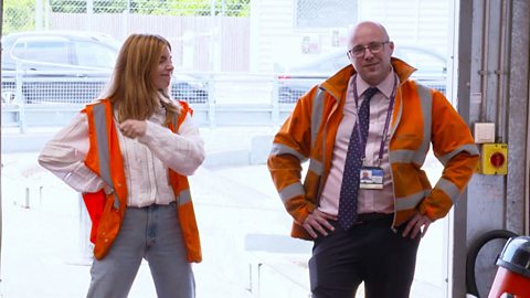 Stacey Dooley talks to one of the managers at Heathrow Airport