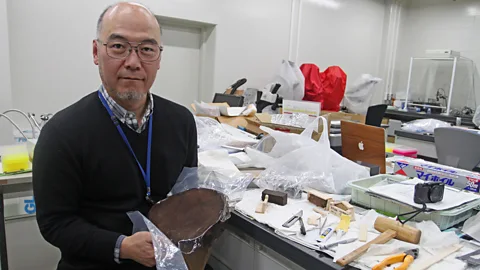 Rachel Nuwer Palaeoclimatologist Takeshi Nakatsuka is using information preserved inside ancient tree stumps to learn about Japan's climate in the past (Credit: Rachel Nuwer)