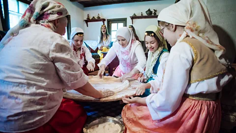Haris Calkic Ćetenija is traditionally made during ‘sijelo’, or sitting parties, while other guests play traditional music and cheer for the ćetenija-makers (Credit: Haris Calkic)