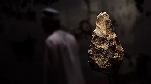 Getty Images A hand-axe, estimated to be 2 million years old, at a museum in Muscat, Oman (Credit: Getty Images)