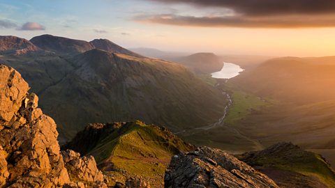 Scafell Pike (on the left) is the tallest mountain in England.