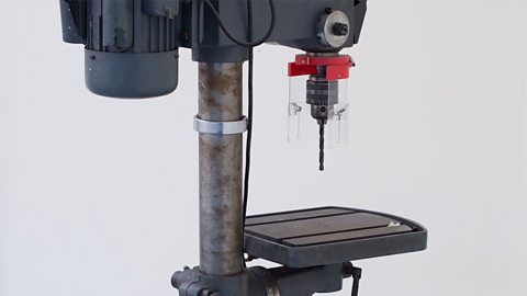 A pillar drill with a rack and pinion arrangement that moves the table bed up and down