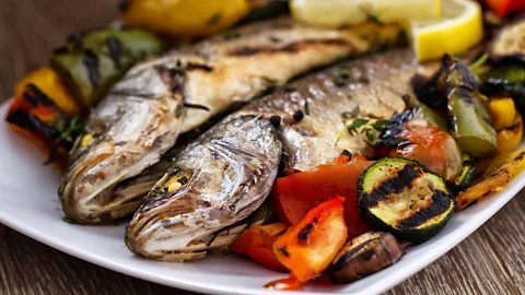 Getty Images One study found a Mediterranean diet, which includes small amounts of fish, was found to create substances crucial to colon health (Credit: Getty Images)
