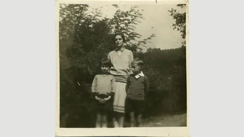Archivio Fondazione CDEC, Milano Primo Levi as a boy, pictured with his mother Ester and younger sister Anna Maria (Credit: Archivio Fondazione CDEC, Milano)