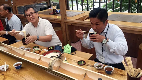 Don George The somen noodles that are caught are then dipped in tsuyu sauce and eaten (Credit: Don George)