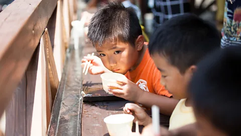 Image navi - QxQ images/Alamy Nagashi somen is usually served outdoors in a group setting so as to marry reverence for nature, food and community (Credit: Image navi - QxQ images/Alamy)