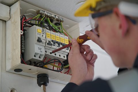 Ryan working on a fuse box 