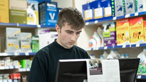 Ellis working in the shop.