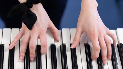 Isabel playing the piano. 