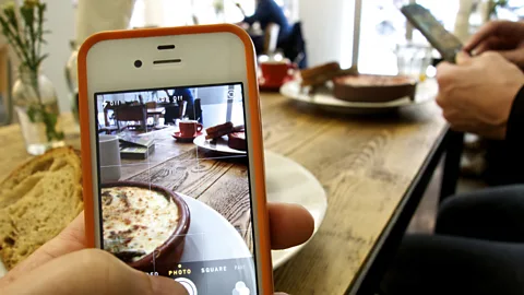 Getty Images Thanks to social media influencers and a host of foodie bloggers, food has become a clickable status symbol (Credit: Getty Images)