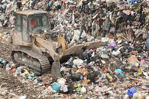 Bulldozer on landfill