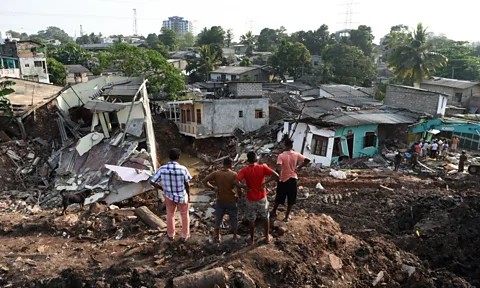 Getty Images Landslides have claimed the lives of hundreds residing in "garbage cities" like Manila's Payatas dump since 2000 (Credit: Getty Images)