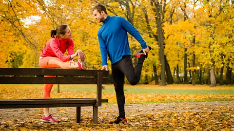 Alamy Many runners stretch before or after their run but while it may increase their flexibility it does little to improve performance (Credit: Alamy)