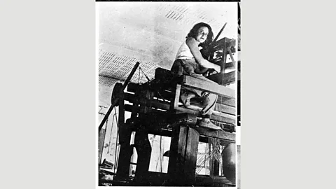 Yamawaki Iwao & Michiko Archives Textiles designer Otti Berger, seen here working at her high loom, came to the UK in the late 1930s (Credit: Yamawaki Iwao & Michiko Archives)